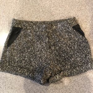 Tweed shorts with vegan leather trim